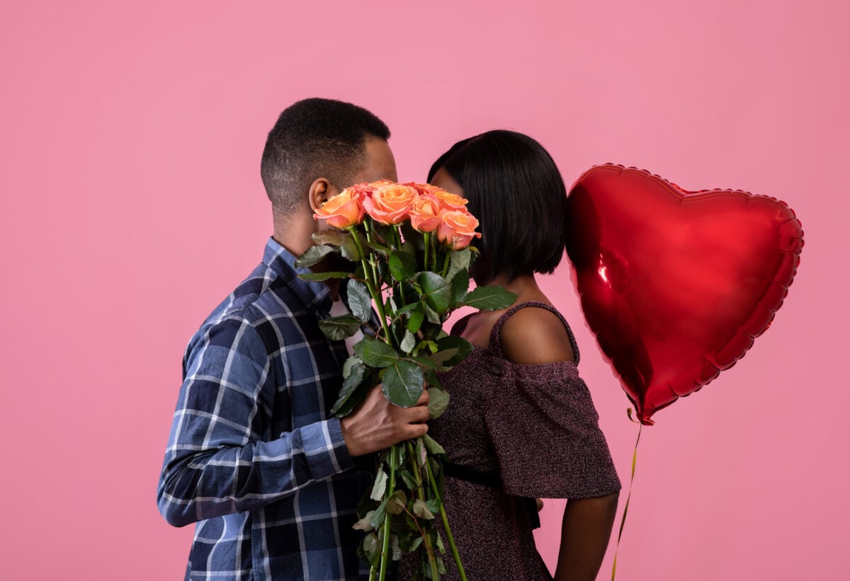 loving african american couple kissing behind bunc 2023 11 27 05 36 58 utc
