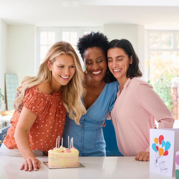 three mature women meeting at home to celebrate fr 2024 01 10 23 25 00 utc