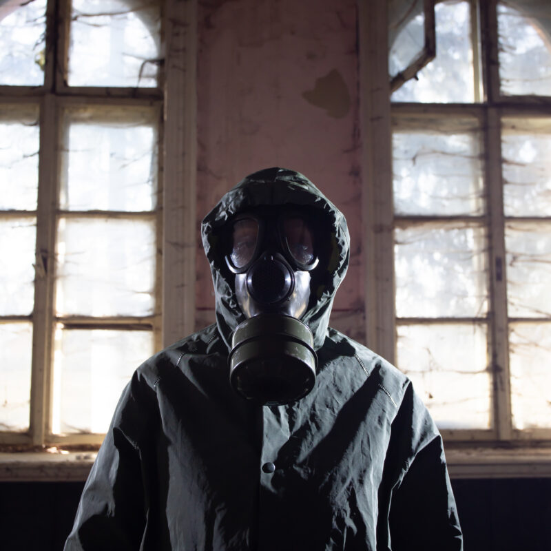 dramatic portrait of a woman wearing a gas mask in 2023 11 27 05 18 53 utc