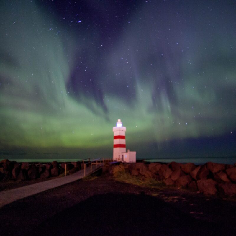 majestic lighthouse situated on a rocky shore illu 2023 11 27 04 57 59 utc