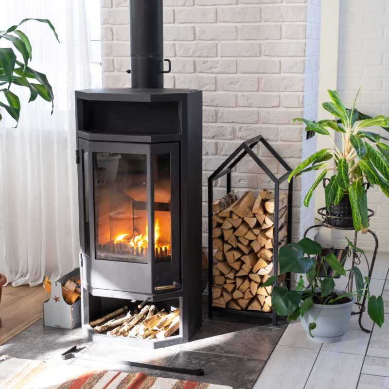 Creating a Cozy Winter Garden Room: Your Ultimate DIY Guide 3 black metal steel fireplace stove with fire and fi 2024 11 01 14 55 05 utc
