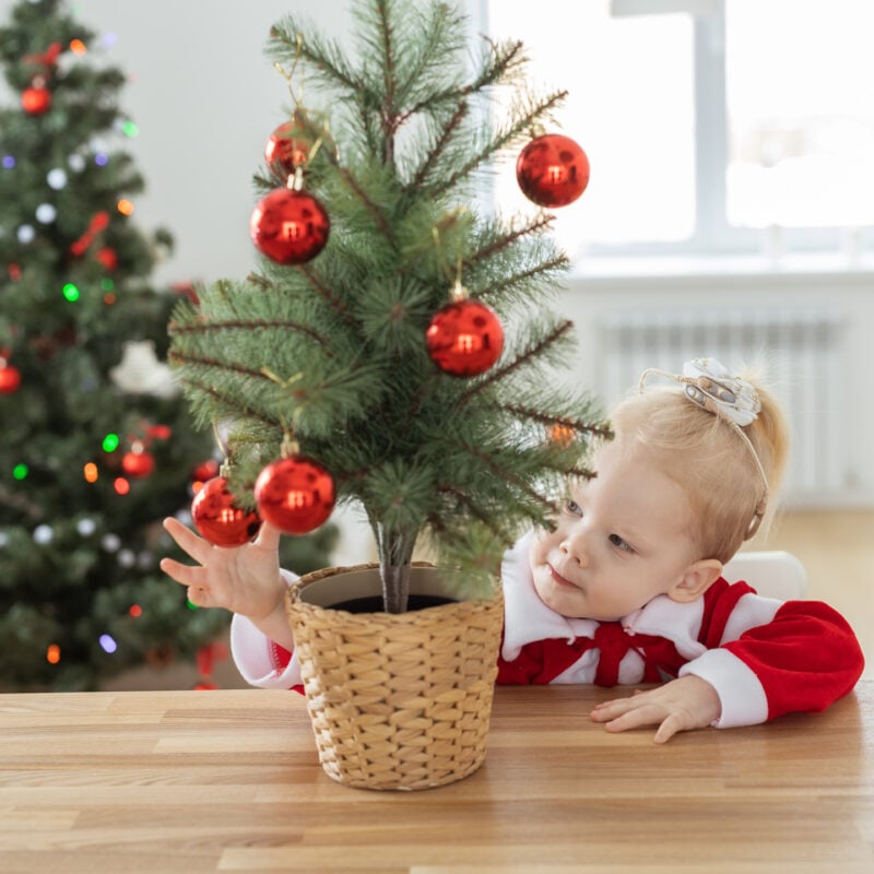 child with cochlear implant hearing aid in christm 2023 11 27 05 06 21 utc