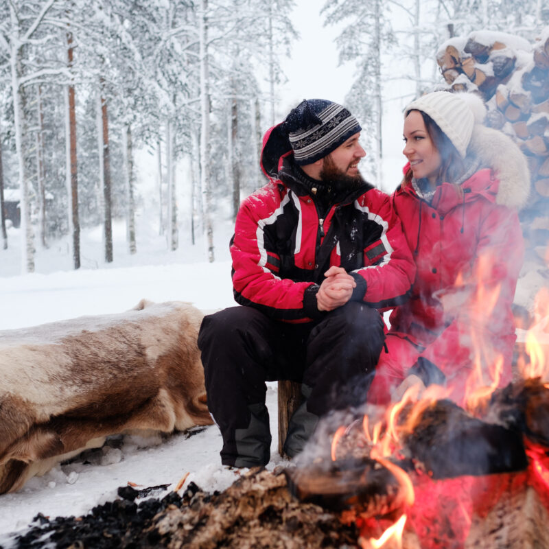 couple near bonefire in winter landscape 2024 10 18 06 34 42 utc