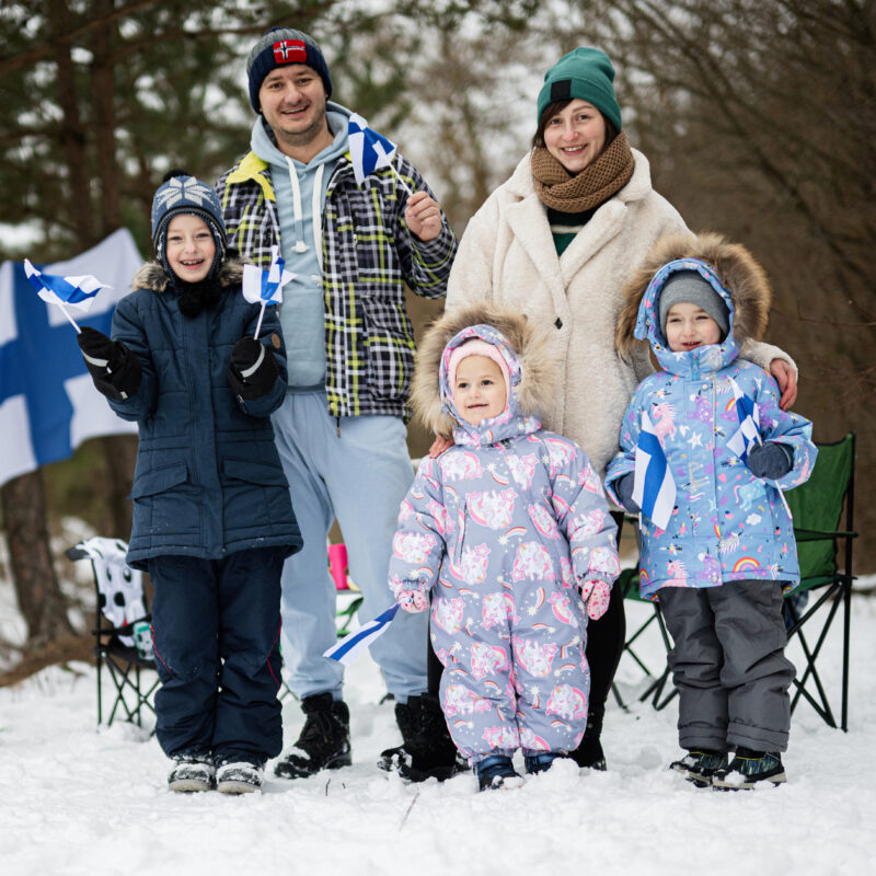 finnish family with finland flags on a nice winter 2023 11 27 04 57 48 utc 1