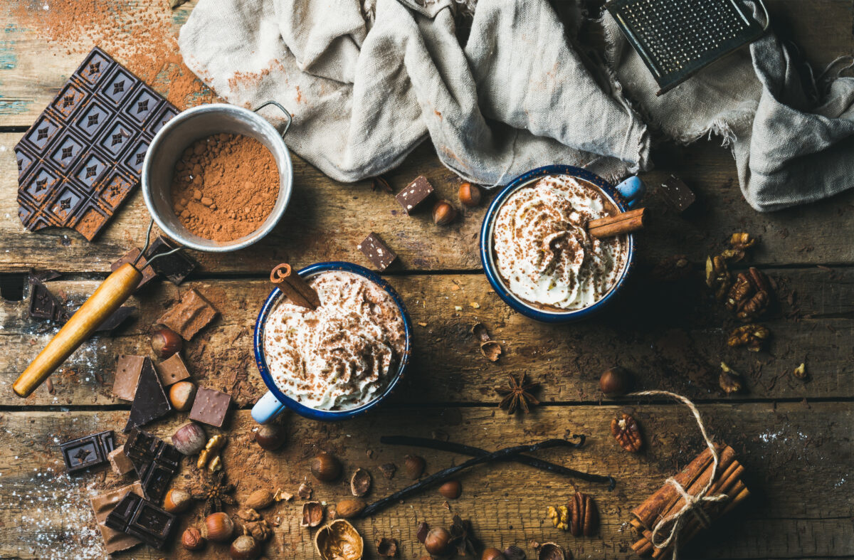 hot chocolate with whipped cream nuts and cinnamo 2024 10 17 23 29 11 utc